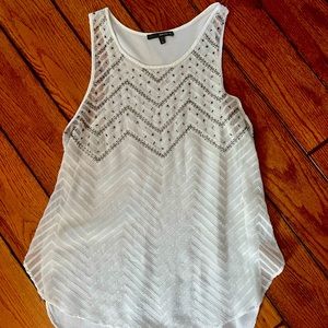 Sleeveless blouse with beading